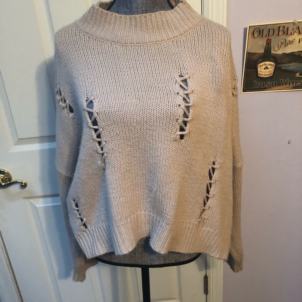 light pink sweater